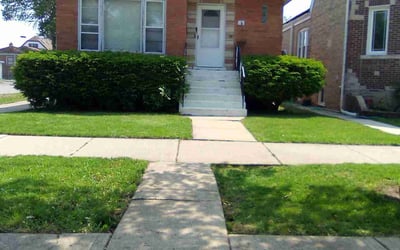 Photo of Stephanie M.'s yard after getting lawn care in Holiday, FL