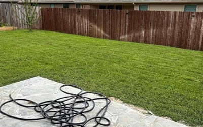 Photo of Isaac E.'s yard after getting lawn care in Burleson, TX