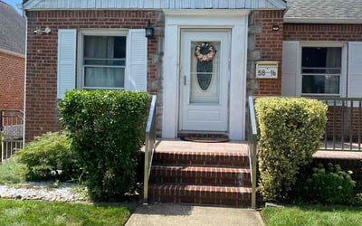 Photo of Jake S.'s yard after getting lawn care in Bayside, NY