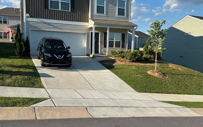Photo of June M.'s yard after getting lawn care in Lumberton, NC