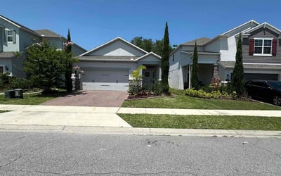 Photo of Kim K.'s yard after getting lawn care in Alafaya, FL