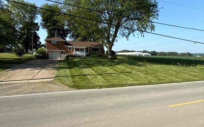 Photo of Lauren T.'s yard after getting lawn care in Louisville, OH