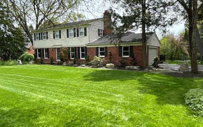 Photo of Melanie W.'s yard after getting lawn care in Holly, MI