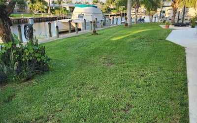 Photo of Elyse M.'s yard after getting lawn care in Stuart, FL