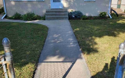 Photo of Jenny S.'s yard after getting lawn care in East Bethel, MN
