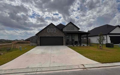 Photo of Tena G.'s yard after getting lawn care in Bryan, TX
