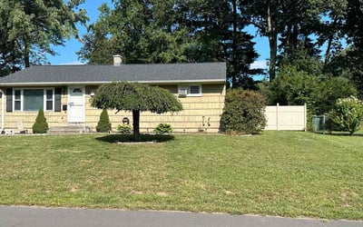 Photo of Janette B.'s yard after getting lawn care in Enfield, CT