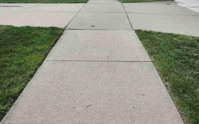Photo of Karen J.'s yard after getting lawn care in Bentonville, AR
