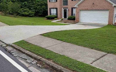 Photo of Addyson B.'s yard after getting lawn care in Denton, TX