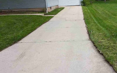 Photo of Gena M.'s yard after getting lawn care in Portage, WI