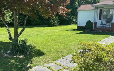 Photo of James R.'s yard after getting lawn care in Rochester, NY