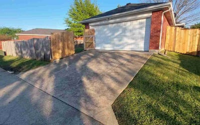 Photo of Dominique C.'s yard after getting lawn care in Arlington, TX