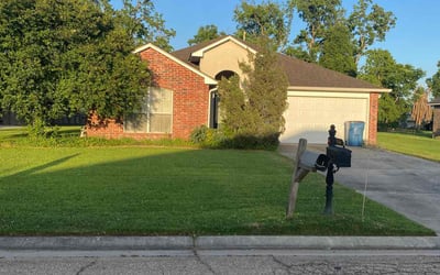 Photo of Kim L.'s yard after getting lawn care in Port Allen, LA