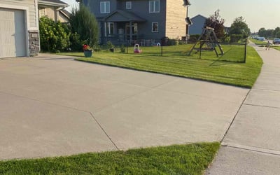 Photo of Pamela T.'s yard after getting lawn care in Indianola, IA