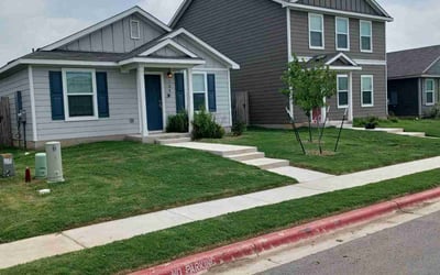 Photo of Jorge G.'s yard after getting lawn care in Bastrop, TX