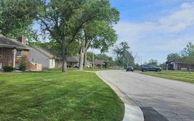 Photo of Caitlin T.'s yard after getting lawn care in Saint Joseph, MO