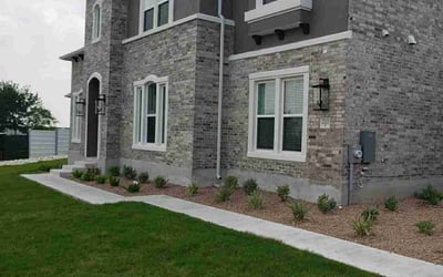 Photo of Magfira J.'s yard after getting lawn care in Manor, TX