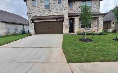 Photo of Tripp T.'s yard after getting lawn care in San Antonio, TX
