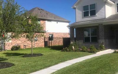 Photo of London M.'s yard after getting lawn care in Manvel, TX