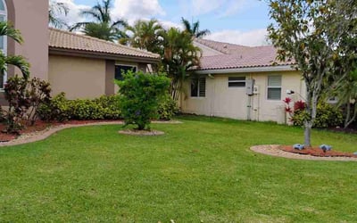 Photo of Carrie H.'s yard after getting lawn care in Davie, FL