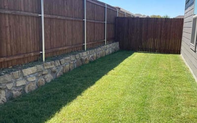 Photo of Charlotte D.'s yard after getting lawn care in Ennis, TX