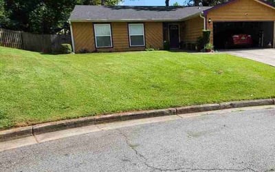 Photo of Kari A.'s yard after getting lawn care in Spring, TX