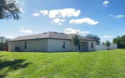 Photo of Maegen D.'s yard after getting lawn care in Poinciana, FL