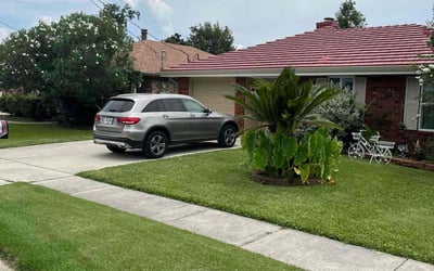 Photo of Savannah M.'s yard after getting lawn care in Naples, FL