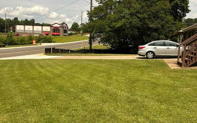 Photo of Alma C.'s yard after getting lawn care in Mableton, GA