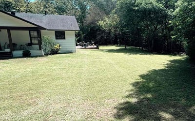 Photo of Melinda D.'s yard after getting lawn care in Henderson, TX