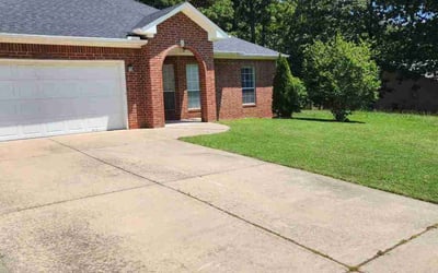 Photo of Marcy B.'s yard after getting lawn care in Maumelle, AR