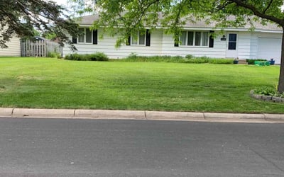 Photo of Aleah H.'s yard after getting lawn care in Coon Rapids, MN