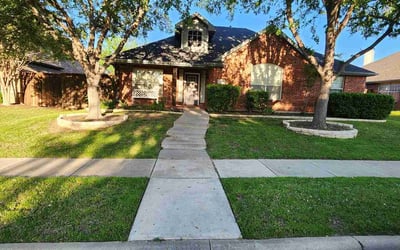 Photo of Bryan B.'s yard after getting lawn care in The Colony, TX