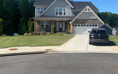 Photo of Samantha C.'s yard after getting lawn care in Powder Springs, GA