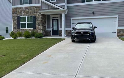 Photo of Carita B.'s yard after getting lawn care in Dallas, GA