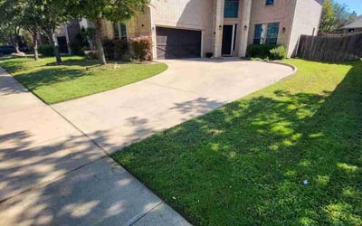 Photo of Mikaila B.'s yard after getting lawn care in Euless, TX