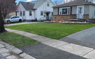 Photo of Lynn T.'s yard after getting lawn care in Rochester, NY