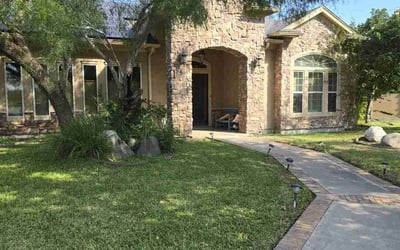 Photo of Keisha W.'s yard after getting lawn care in Harlingen, TX