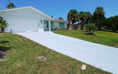 Photo of Juanita R.'s yard after getting lawn care in New Smyrna Beach, FL