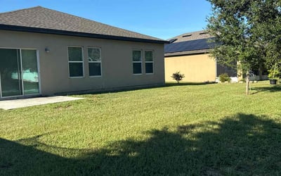 Photo of Summer J.'s yard after getting lawn care in Lake Wales, FL
