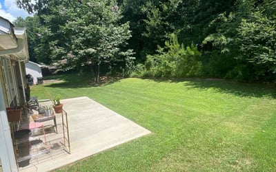 Photo of Monica C.'s yard after getting lawn care in Lilburn, GA