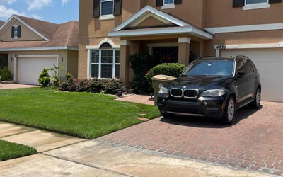 Photo of Whitney B.'s yard after getting lawn care in Kissimmee, FL