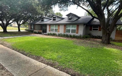 Photo of Sandra M.'s yard after getting lawn care in Quinlan, TX