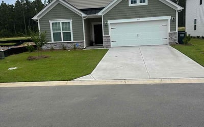 Photo of Marcia S.'s yard after getting lawn care in Navarre, FL