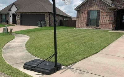 Photo of Jeneile L.'s yard after getting lawn care in Port Arthur, TX