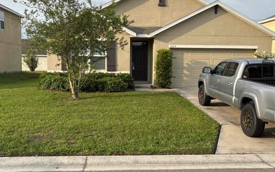 Photo of Rosemary M.'s yard after getting lawn care in Boynton Beach, FL