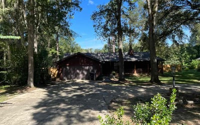 Photo of Christina B.'s yard after getting lawn care in Oakleaf Plantation, FL