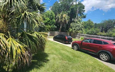 Photo of Dashawn W.'s yard after getting lawn care in Theodore, AL