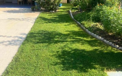 Photo of Kristopher W.'s yard after getting lawn care in Burton, MI