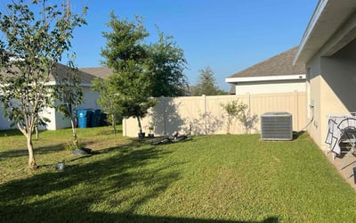Photo of Emily C.'s yard after getting lawn care in Haines City, FL
